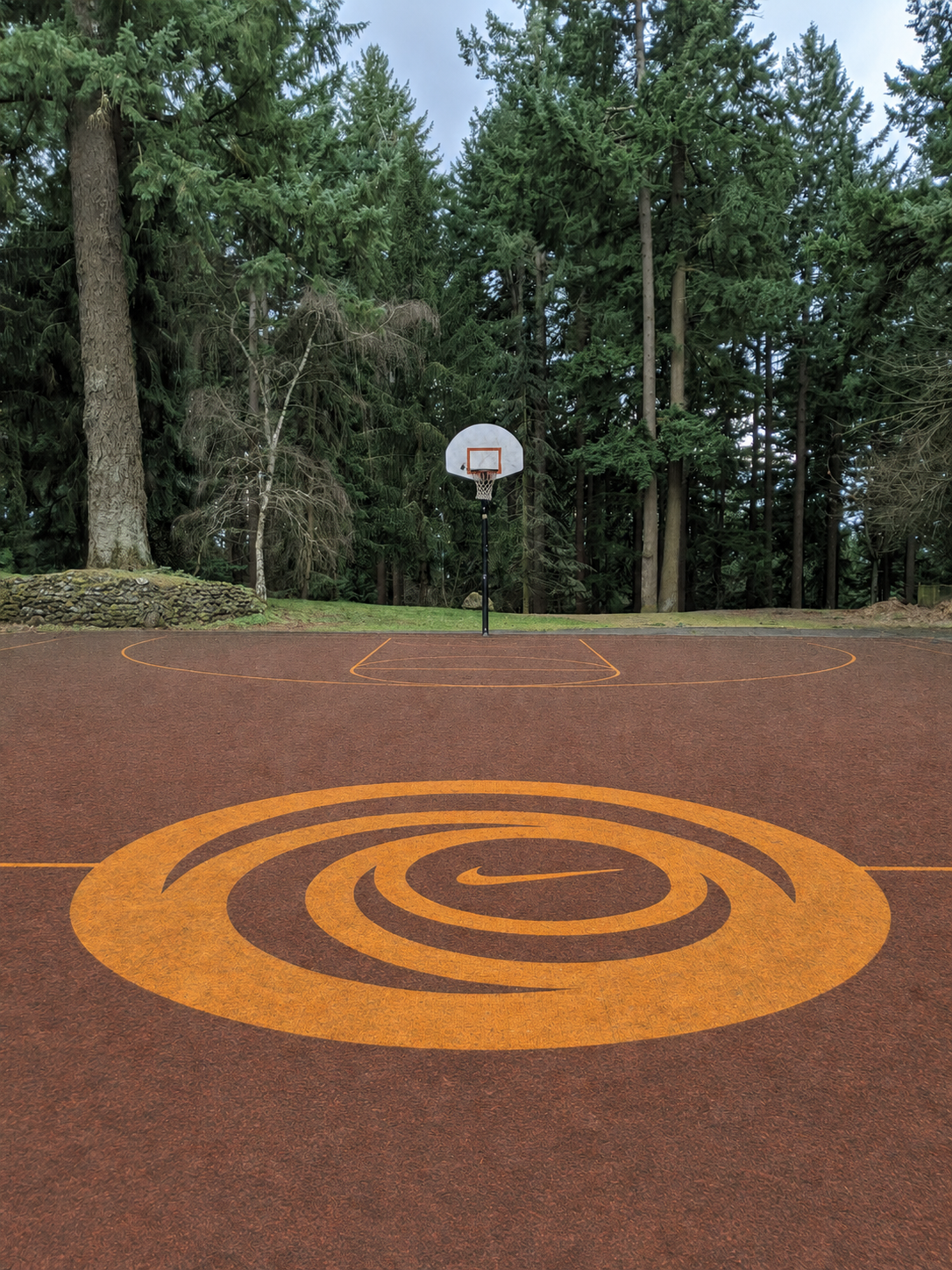 Outdoor basketball court in Portland at golden hour